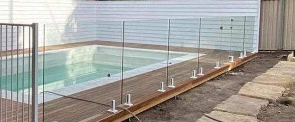 Image of frameless glass pool fence installation